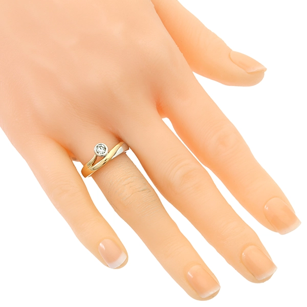 Diamantring, 18K, Gelb-/Weißgold. Brillant 0,23 ct