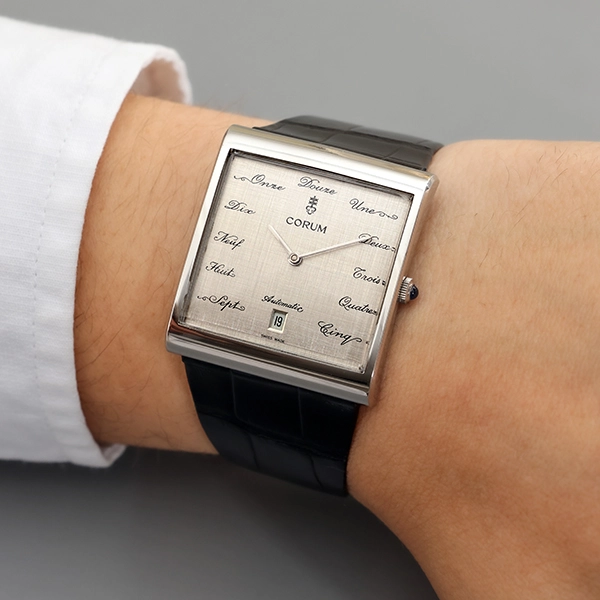 Herrenuhr, Corum 'Buckingham' Automatik
